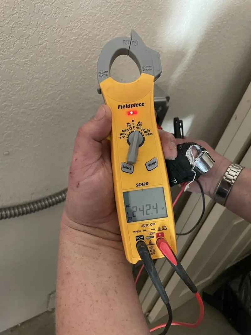 Voltage testing with clamp meter during Hot Tub / Pool Electrical Wiring in Nichols Hills